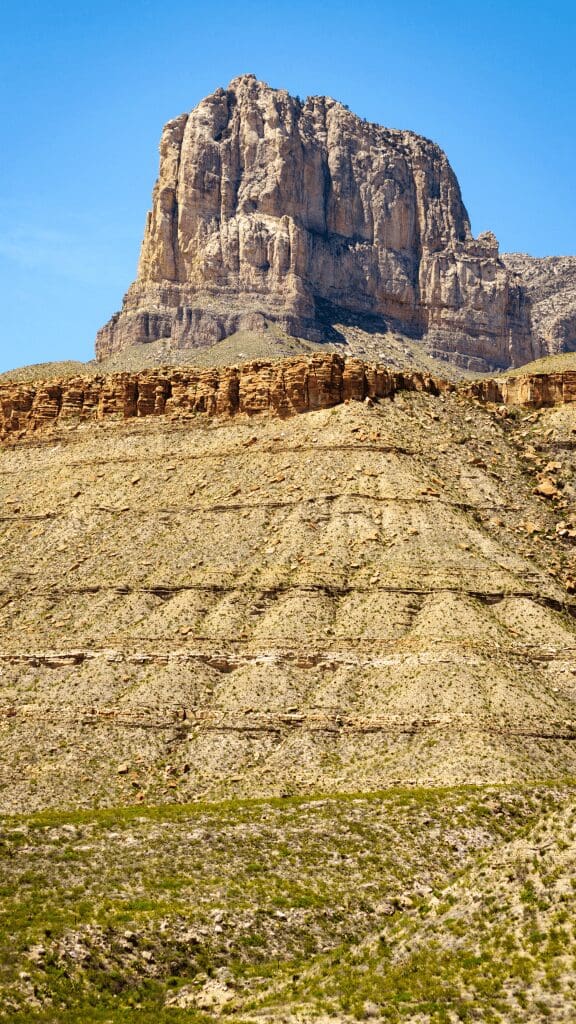 view of mountain with rock cliffs