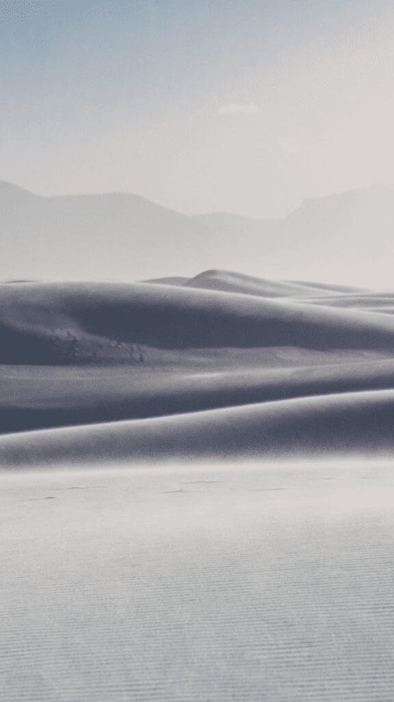 view of rolling hills of white sand