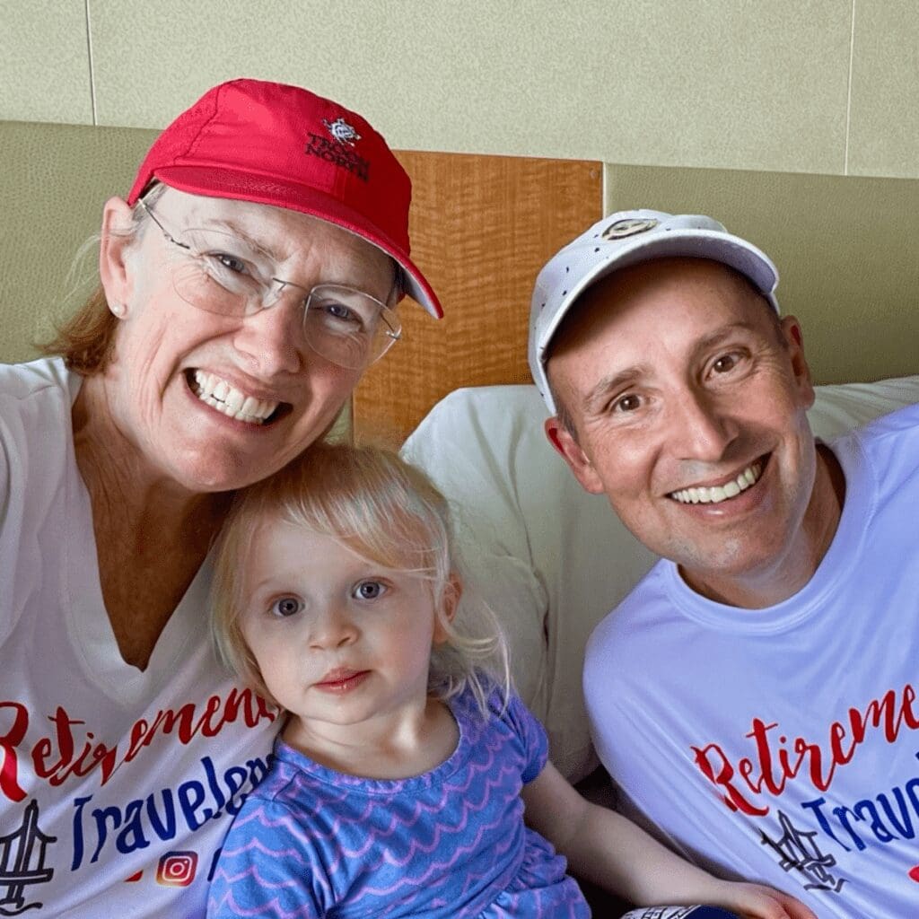 Retirement Travelers posing with granddaughter