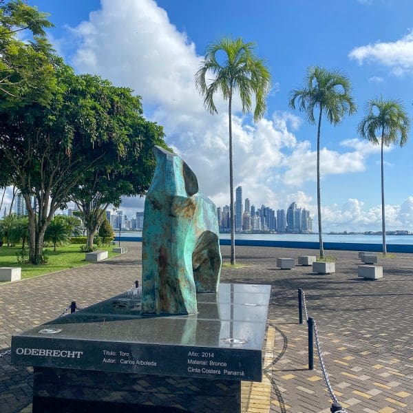 view of statue in park with panama city skyline in background