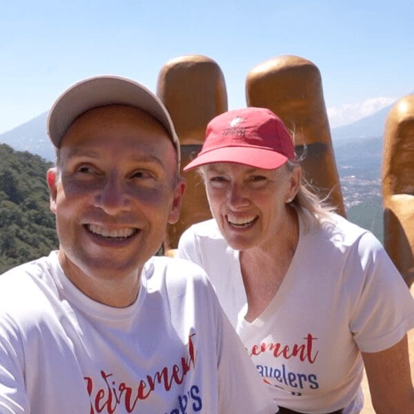 John & Bev sitting at top of hill overlooking Antigua