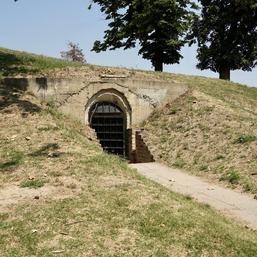 a door in a mound of dirt