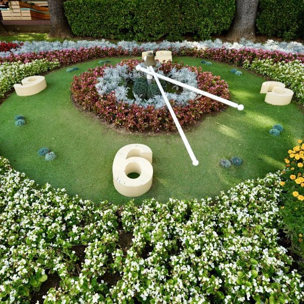 Outdoor garden clock made of flowers