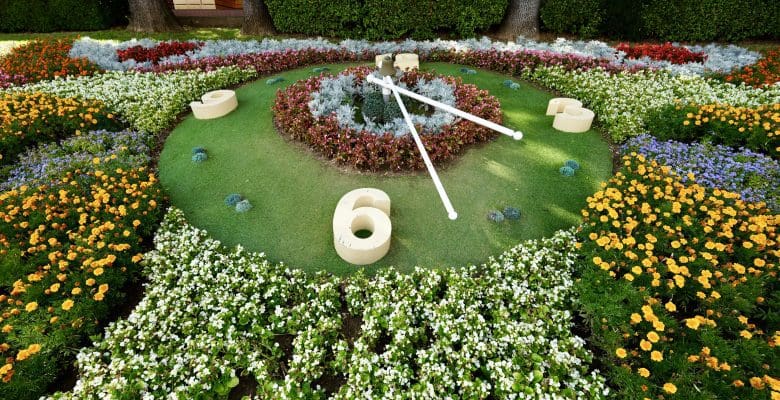 Outdoor garden clock made of flowers