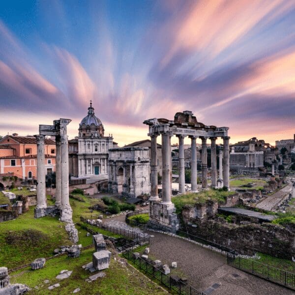 Ancient ruins with a sunrise background in Rome, Italy