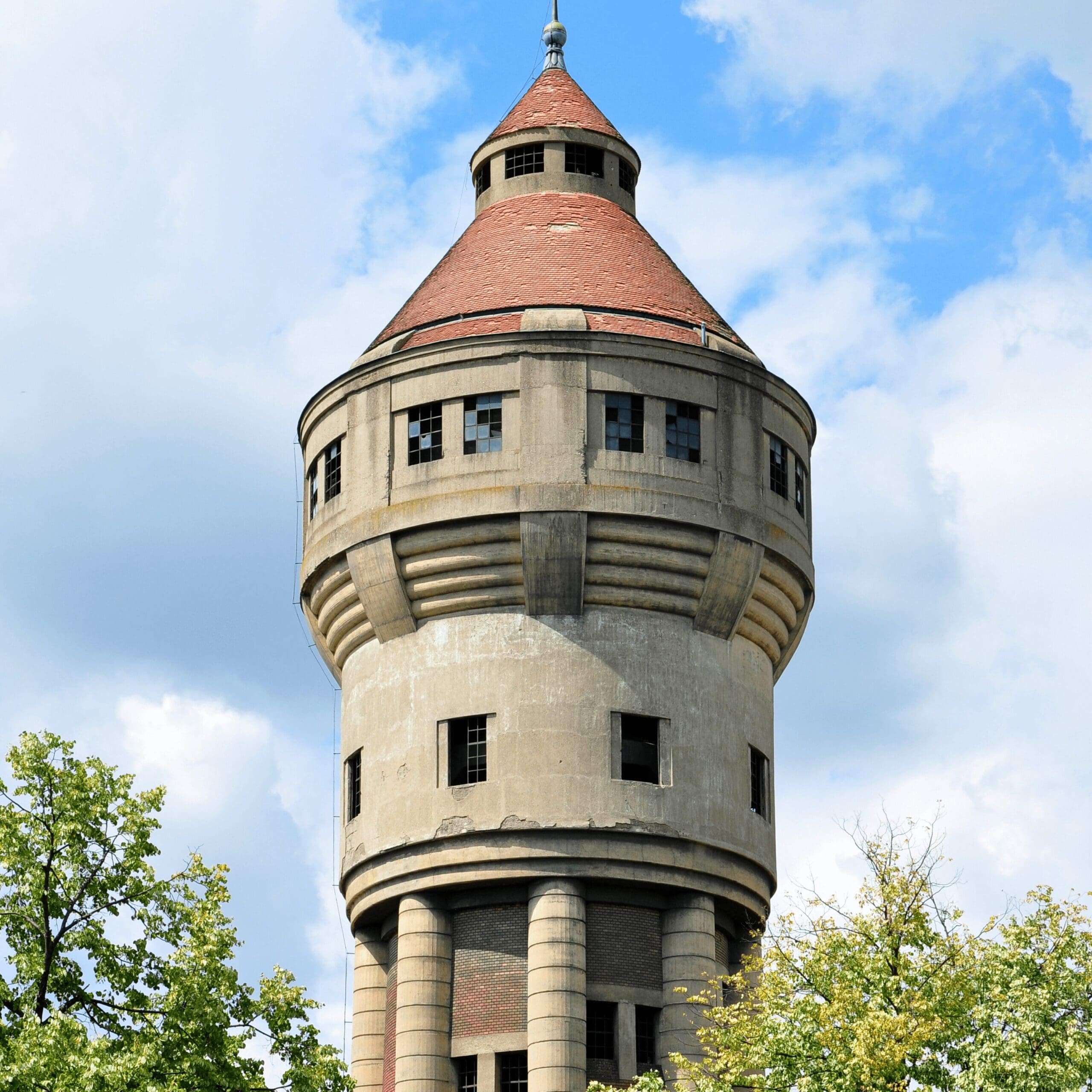 tower made with bricks and red roof