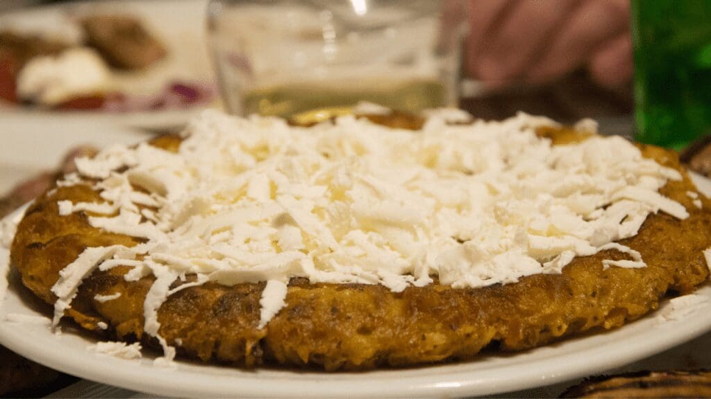 a dish with pie and cheese