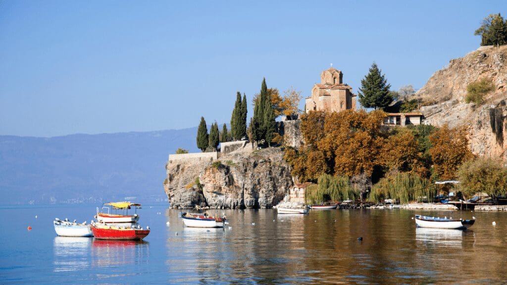 a view of the coast with boats