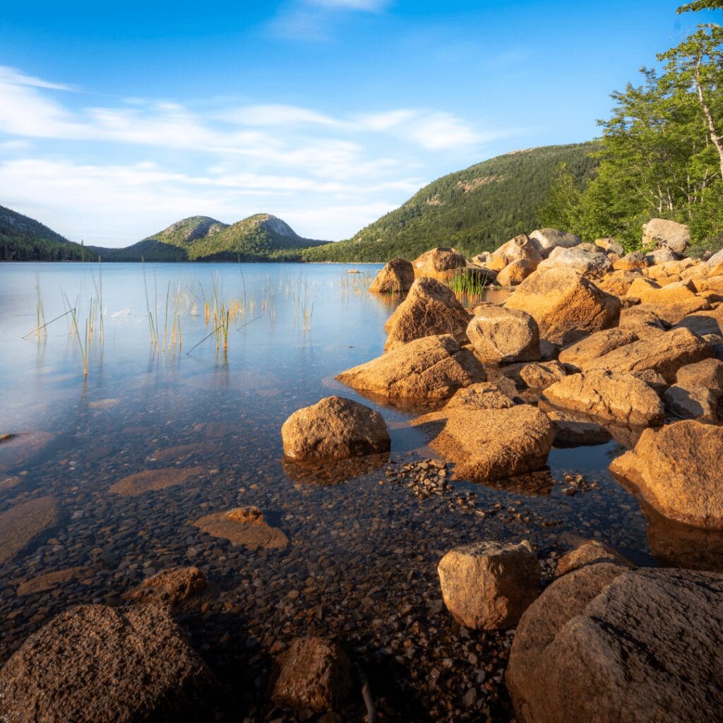 view of lake with rocks on shore