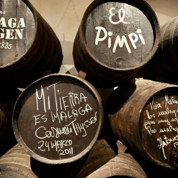 Dark barrels outside a restaurant in Malaga Spain