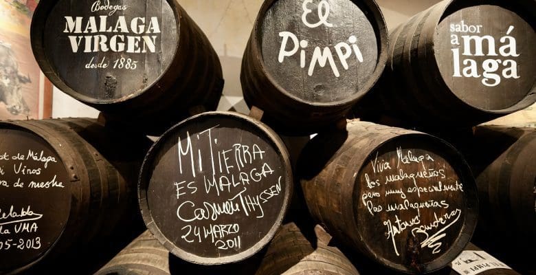Dark barrels outside a restaurant in Malaga Spain