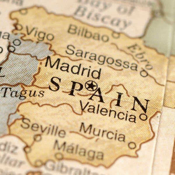 a golden map with Spain and Madrid in the middle