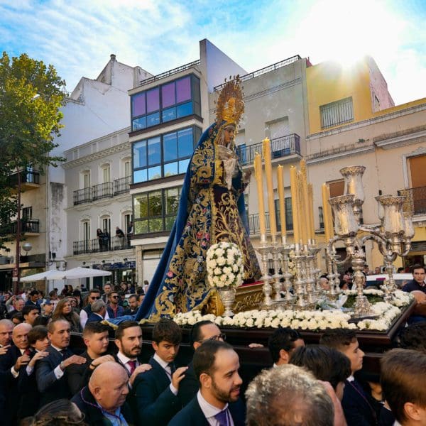 Holy procession entering a church in Seville, Spain