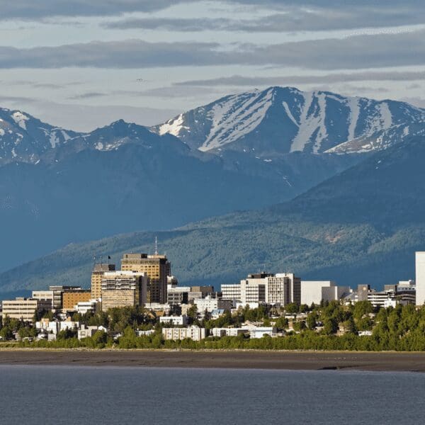 Skyline of Anchorage, alaska with mountains in the background