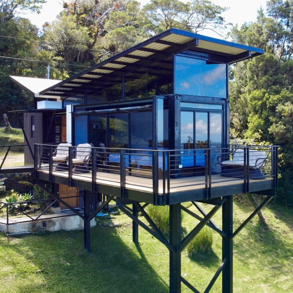 container house on the side of a hill