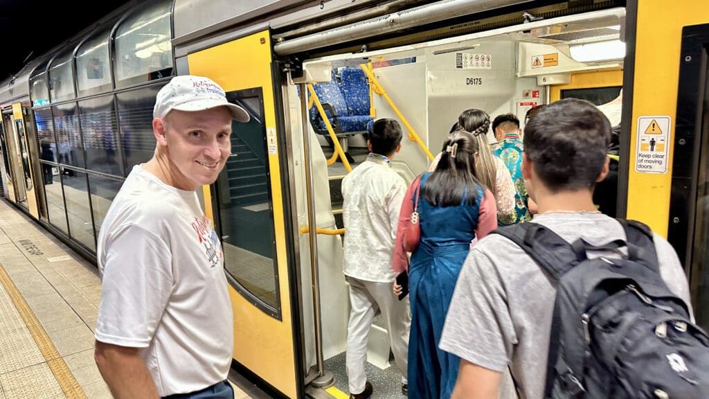 people getting on a metro train in sydney Australia