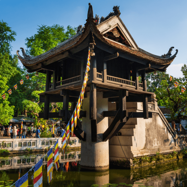 Ancient temple next to body of water and trees in Hanoi