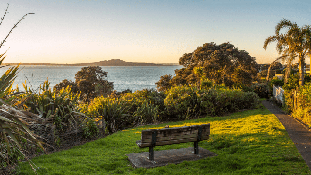 view from a bench in a tropical setting overlooking an island