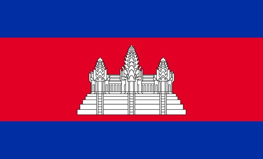 a red and blue flag with angkor wat in white in the middle.