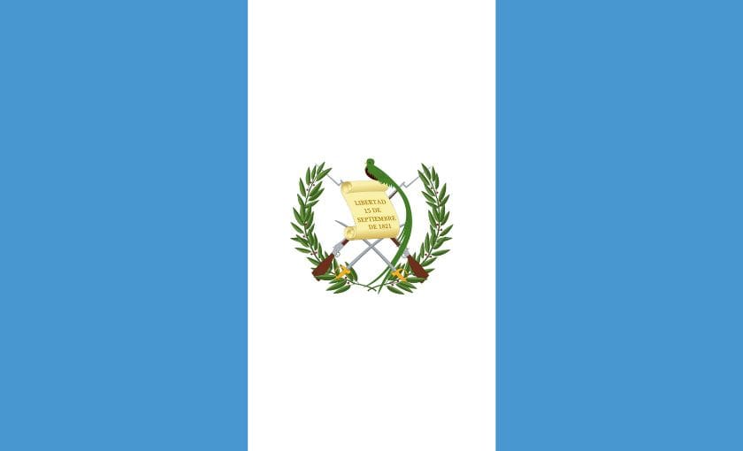 Blue and white flag with emblem in middle.