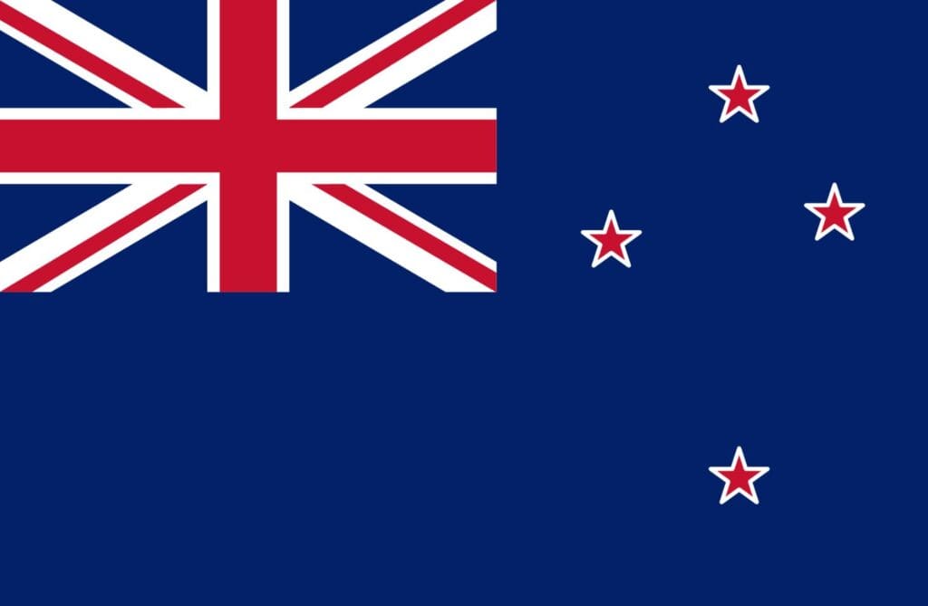 Blue flag with Union Jack in corner and red stars on blue.