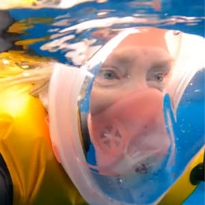 Bev of retirement travelers snorkeling in raja ampat