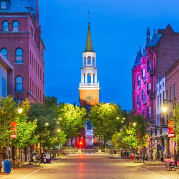downtown street in Burlington Vermont with buildings and town hall