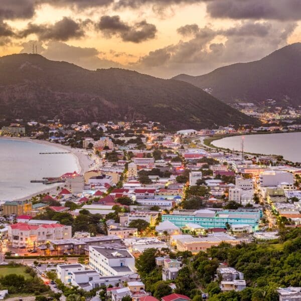 aerial view of Philipsburg showing mountains, city buildings, and beach areas
