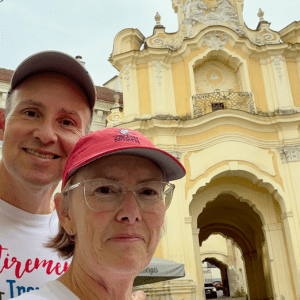 John and Bev Retirement Travelers standing near the Gate of Dawn