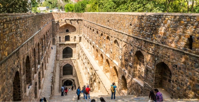 brick well with large arched walls that you can walk into