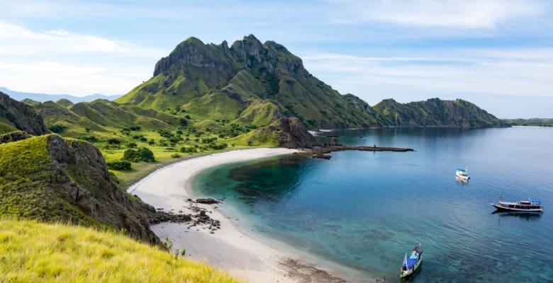 view of shoreline and mountains on komodo island