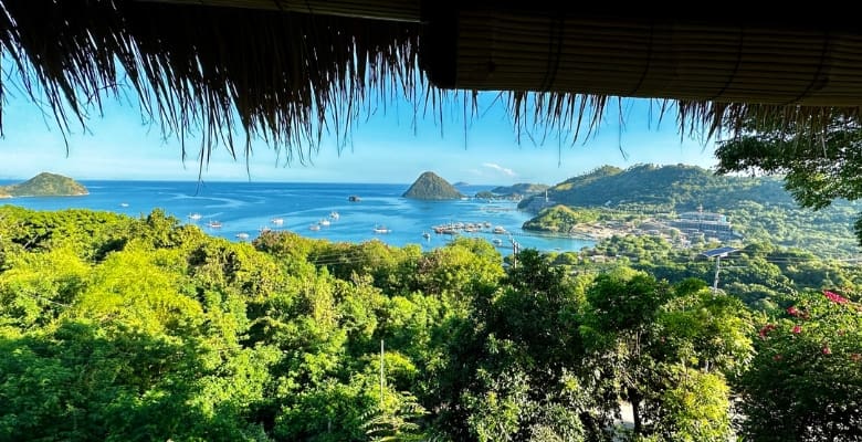 view of water and islands from a hillside hotel in indonesia