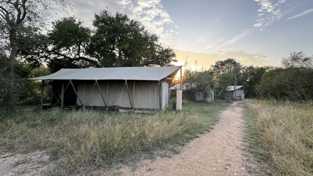 A tent in the Honeyguide Campground.