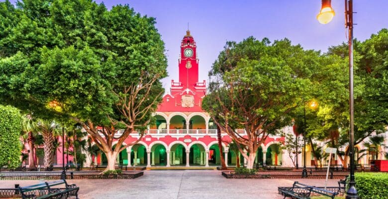 red clock tower in dowtown Merida Mexico