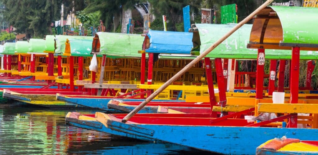 Xochimilco floating gardens with the boats on the water.