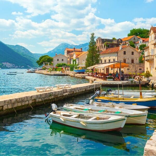 boats along shoreline in montenegro