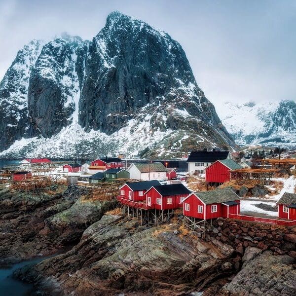 red houses and mountain in norway